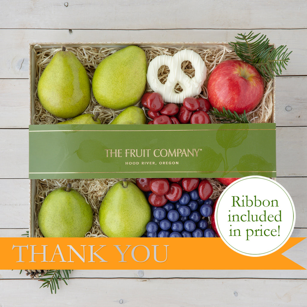 Thank You gift box with pears, apples, and chocolate covered pretzels, cherries, and blueberries