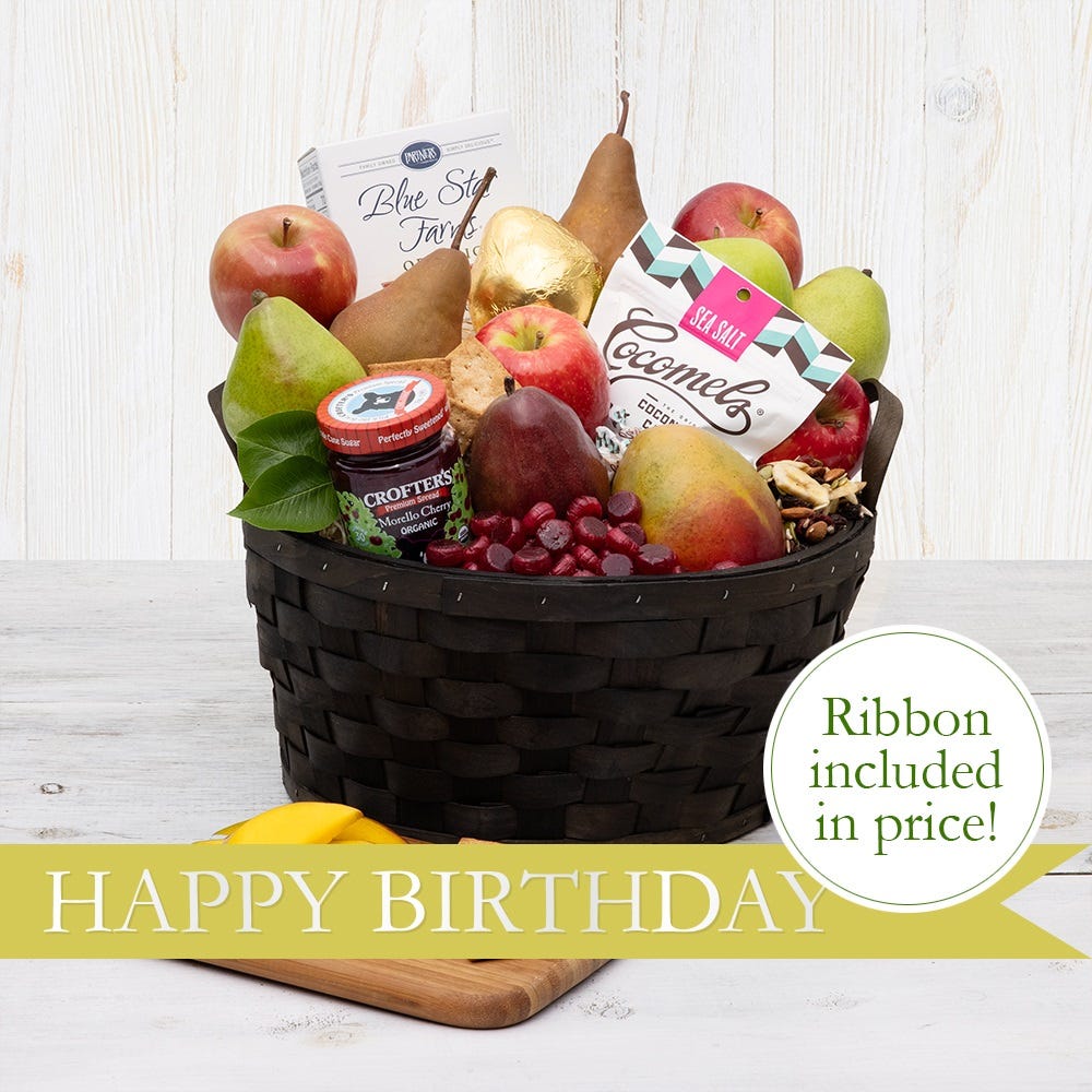 wood woven basket with Organic fruit Organic sweet & savory treats and happy birthday ribbon 