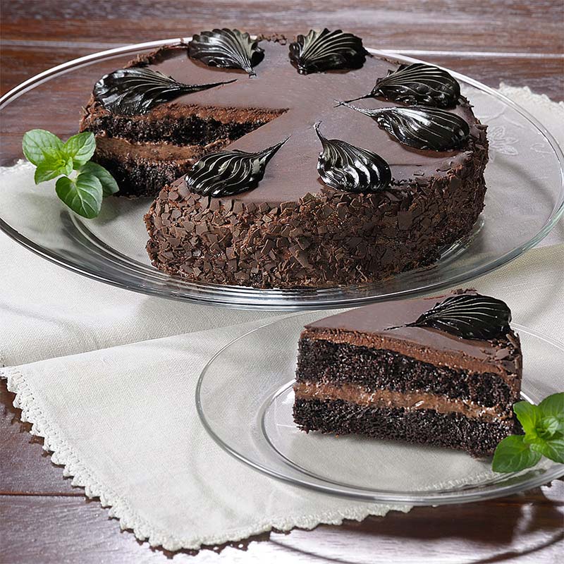 chocolate mousse between two layers chocolate cake, milk chocolate frosting & dark chocolate glaze